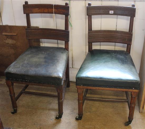 Pair oak green leather seated chairs